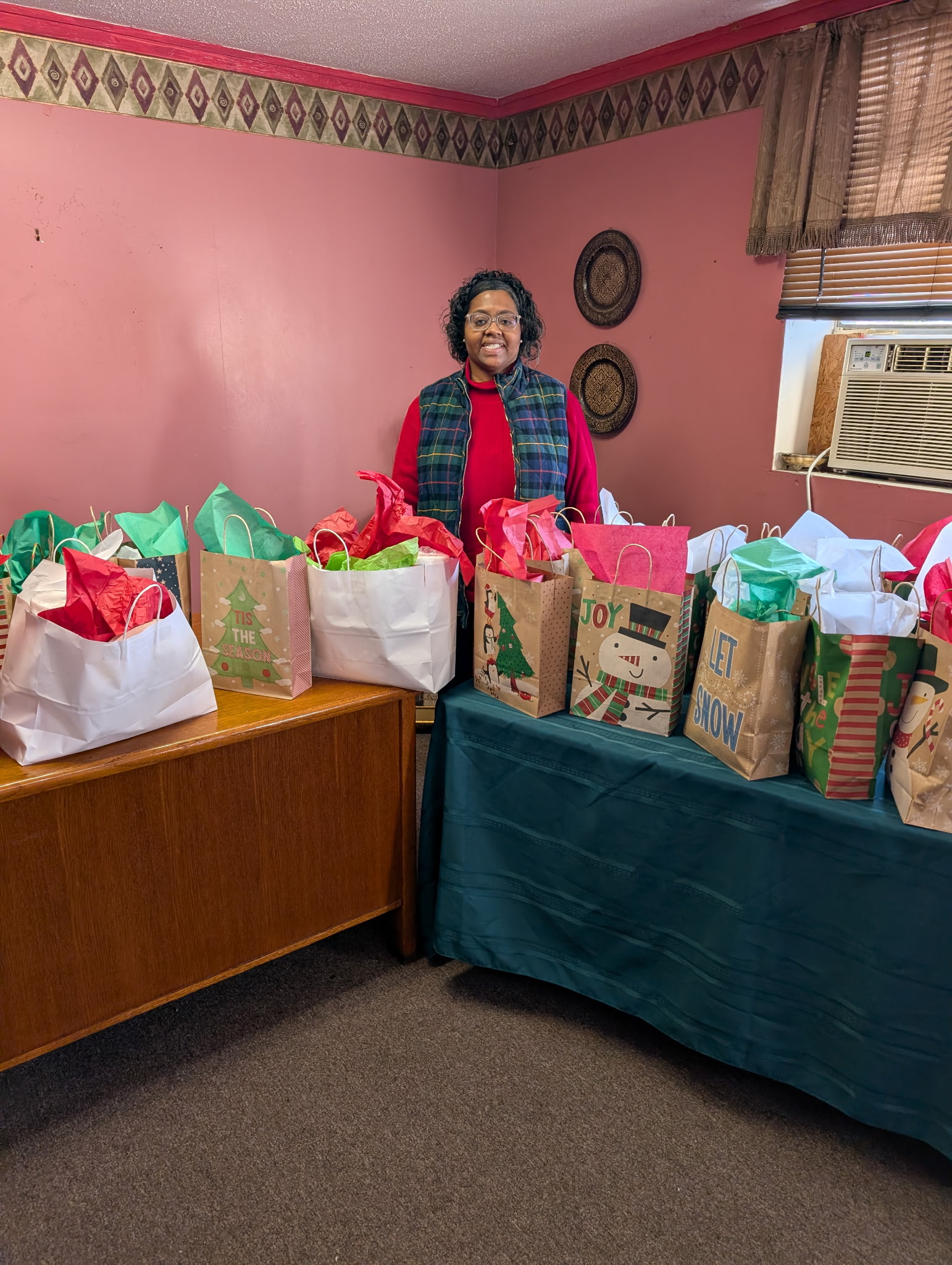 CHB3 Dr. Shelicia Morton-Ford with the prepped holiday bags.