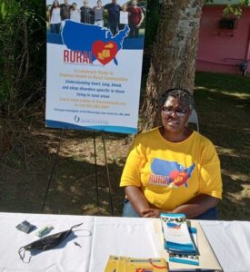 woman sitting at rural table