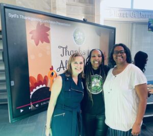 group of three woman smiling