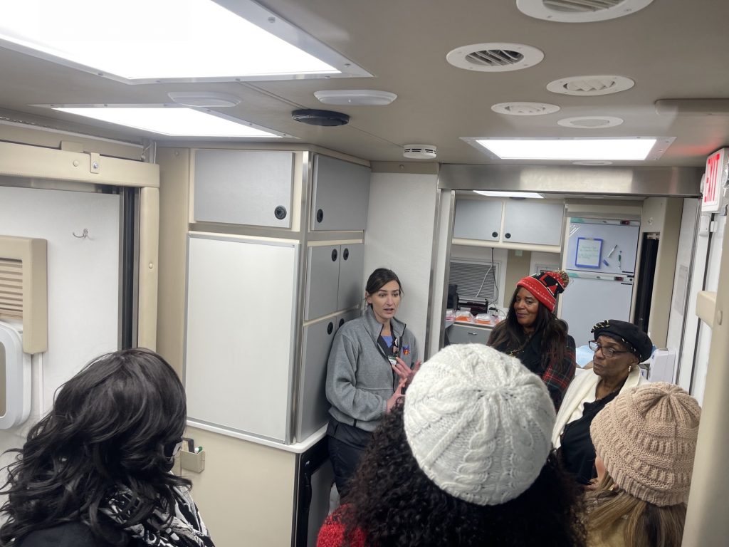 group of people in rural trailer