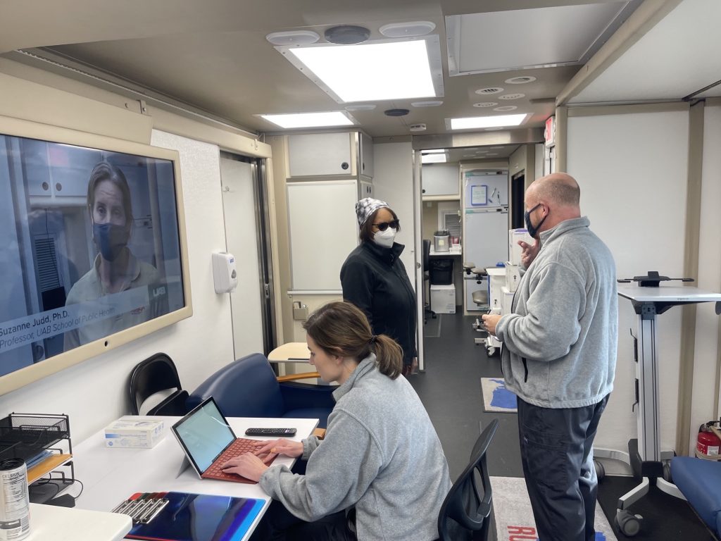 people inside rural trailer