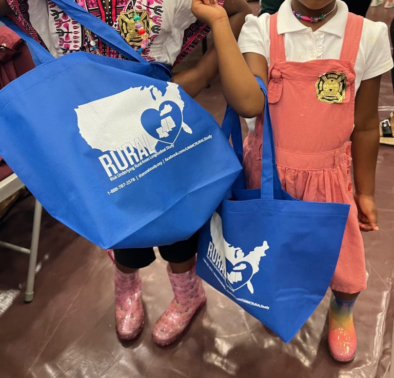kids holding rural swag