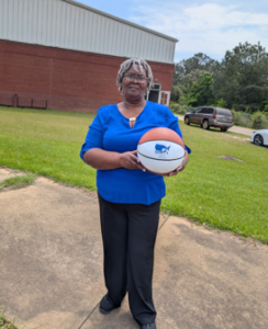 woman holding basketball