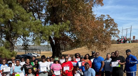 large group of people holding certificates
