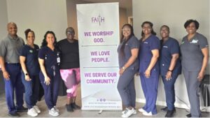 health fair team with sign