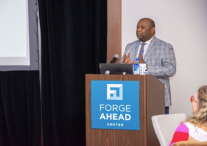 keynote speaker at the podium