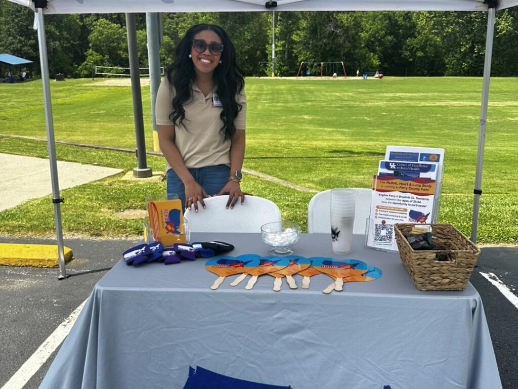 Sierra Williams smiling at RURAL table