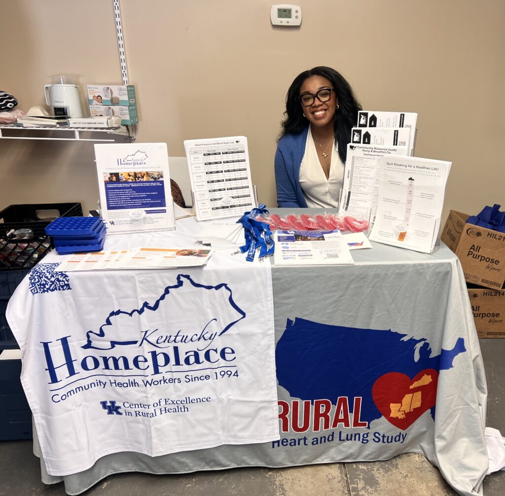 Sierra Williams smiling at RURAL table